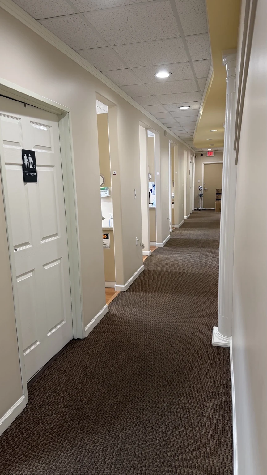 Interior hallway leading to the dental treatment rooms